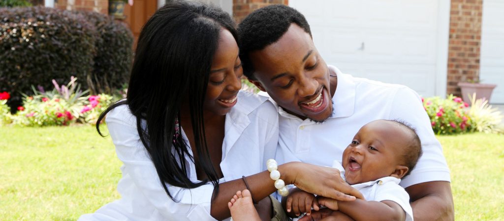 Happy-Family-Outside-Home