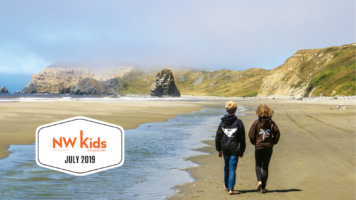 two kids walking on beach