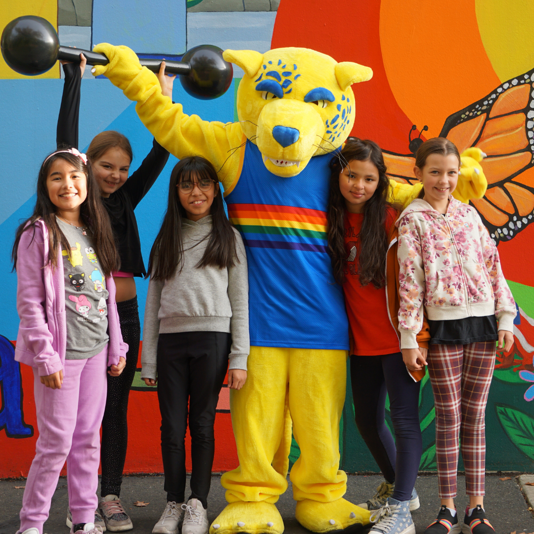 Arco Iris Students with J.J. the Mascot